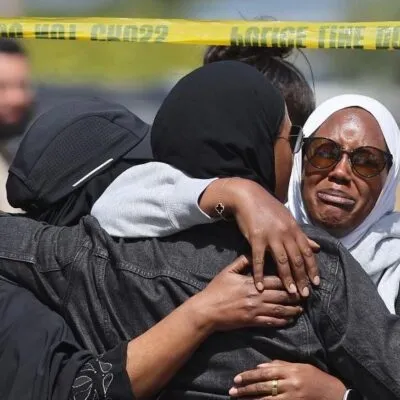 Members of the Muslim community in San Diego react after shooting at their mosque on 18 May 2026