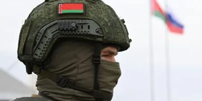 Беларусь и Россия начали учения по боевому применению ядерного оружия. Украина призывает партнеров к жесткому ответу 8 Голова военного с флагом Беларуси