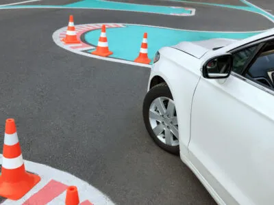 modern car on test track with traffic cones above 2026 03 27 01 40 21 utc новости водительские права, МВД Грузии