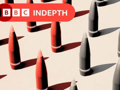 A treated image showing missiles coloured red and grey. They sit against a beige background.